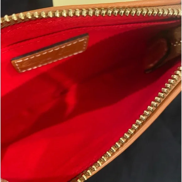 DOONEY & BOURKElarge zip wristlet! Such a pretty plaid with tan leather trim!